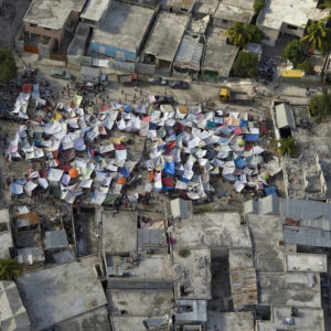 Haitians set up impromtu tent cities thorough the capital after an earthquake measuring 7 plus on the Richter scale rocked Port au Prince Haiti just before 5 pm yesterday, January 12, 2009.